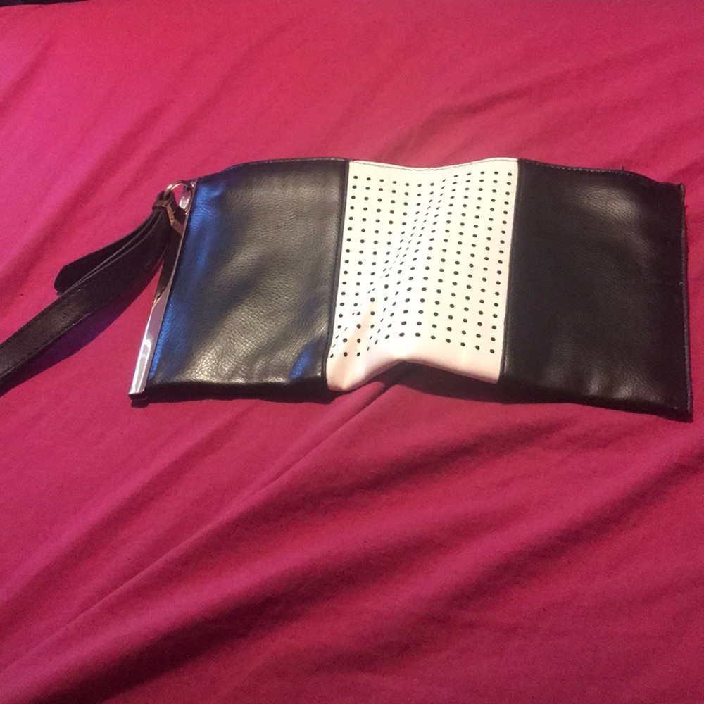 White polka dot clutch